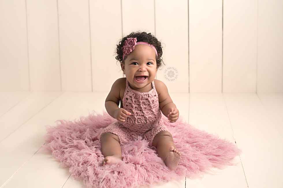 7 month black baby, pink flokati
