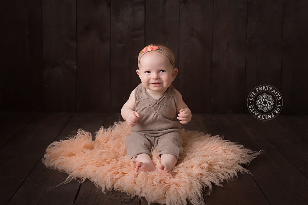 baby photographer, lancaster pa, baby girl on peach rug