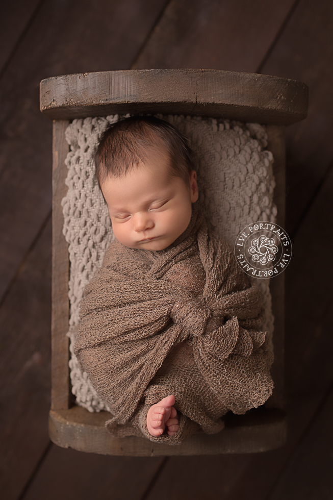 newborn baby photographer, Lancaster PA, boy in bed