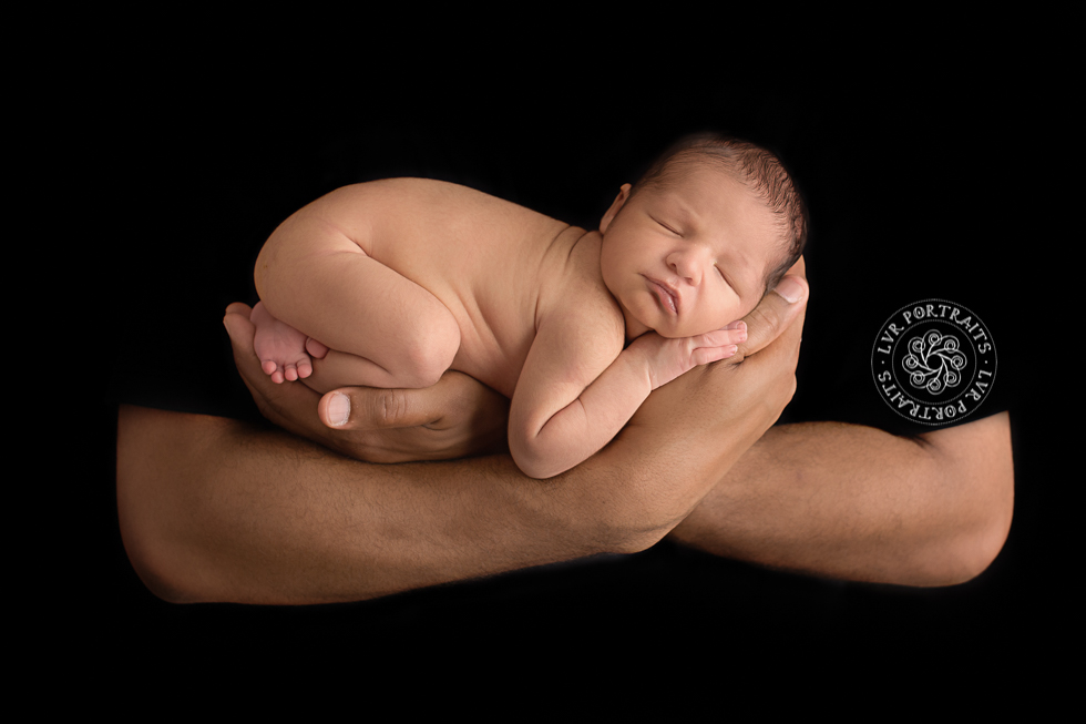 Lancaster newborn photography, baby in dad's arms,