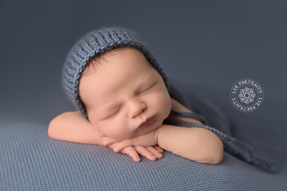 Lancaster pa custom newborn photography, newborn photography, baby on beanbag in bonnet