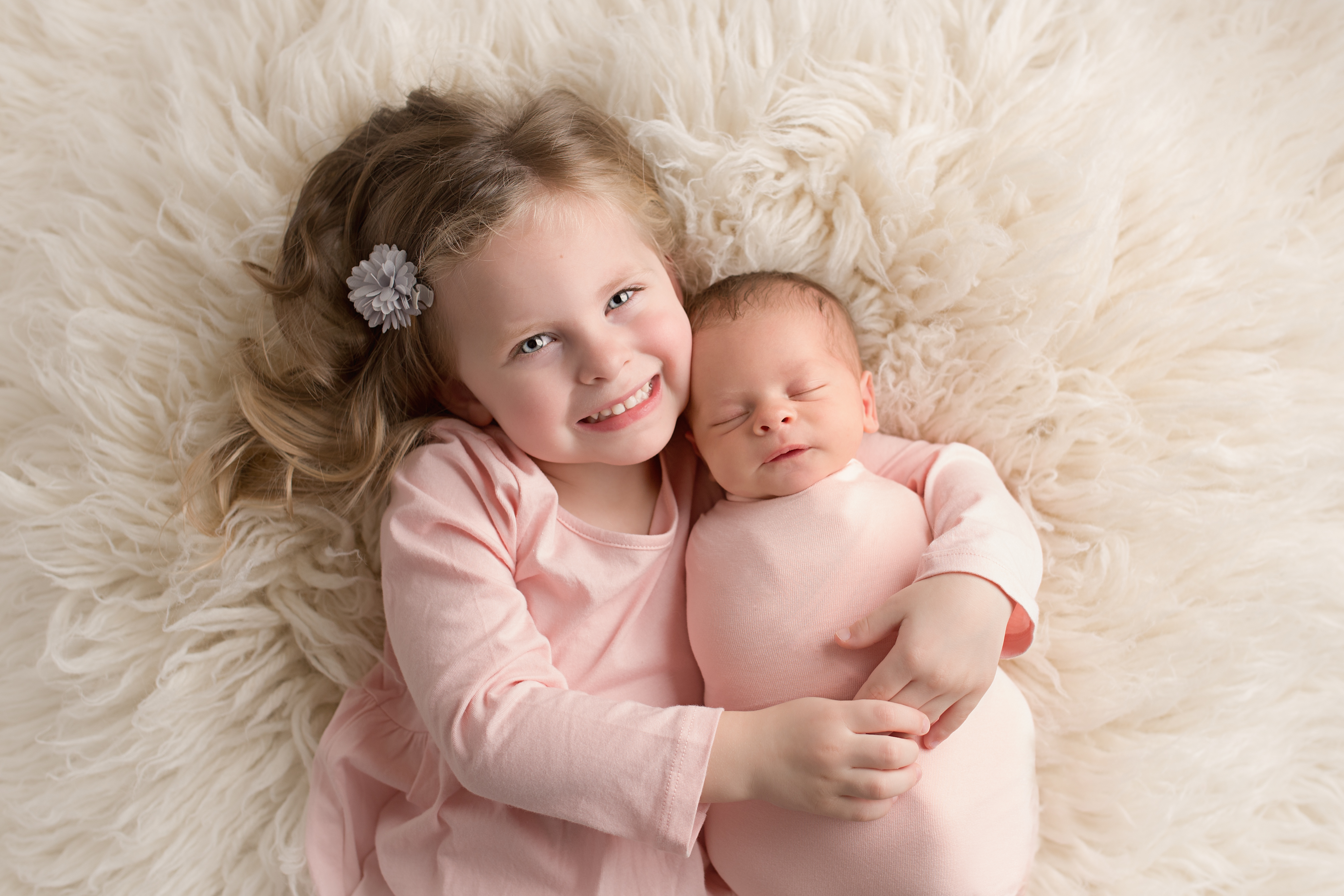 Lancaster-newborn-photography-studio, newborn & sibling on flokati